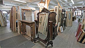 A photo of two of the main floor aisles, with doors and antiques in view